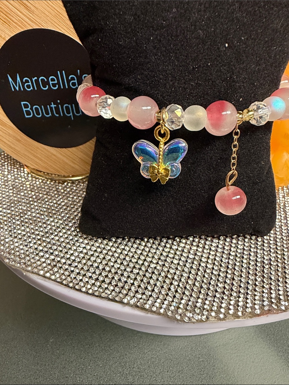 Pink Beaded Bracelet with Iridescent Butterfly Charm